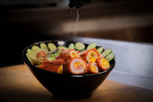 Close Up Photo of Food on Black Bowl 