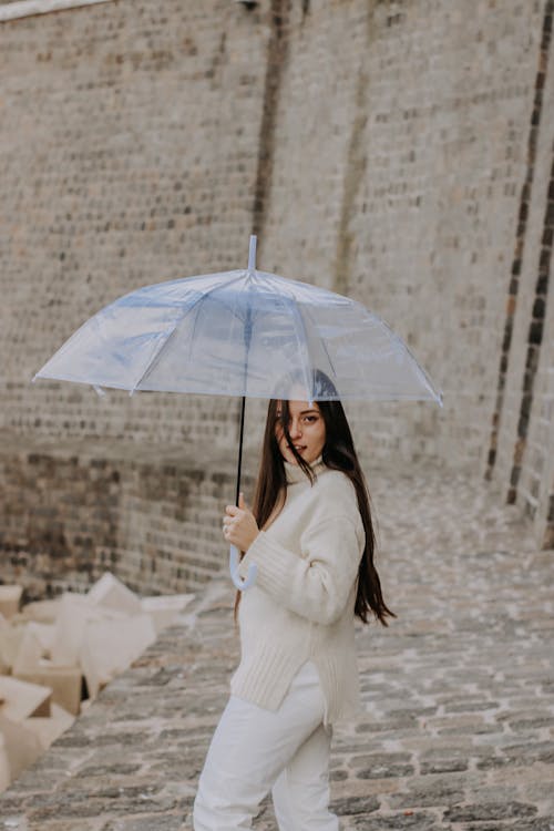 Základová fotografie zdarma na téma deštník, držení, osoba