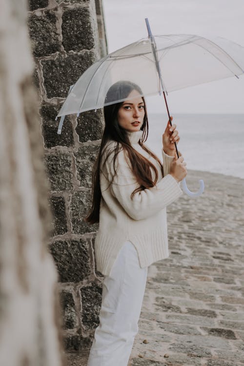 Základová fotografie zdarma na téma deštník, držení, osoba