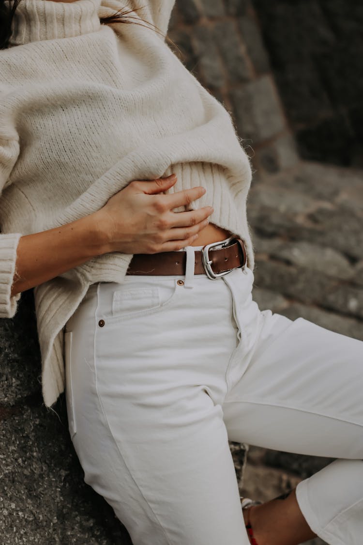 Woman With Hand On Stomach