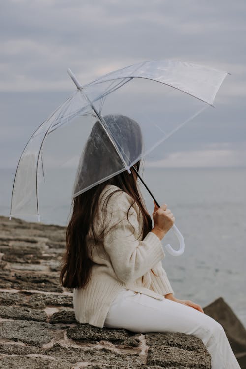 Základová fotografie zdarma na téma deštník, držení, hrana