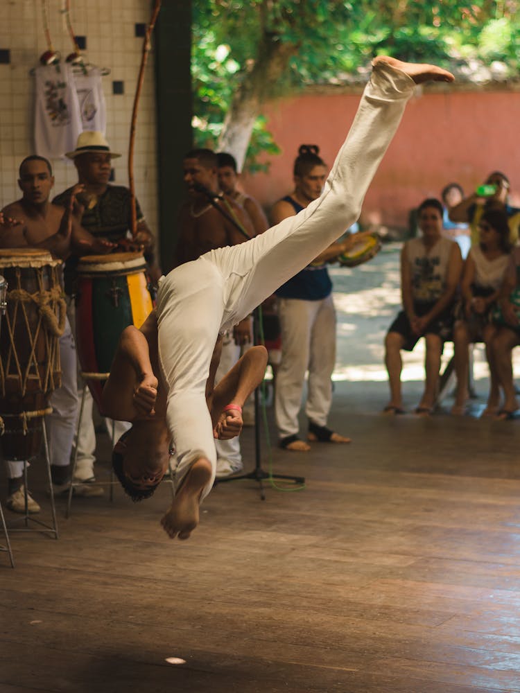 A Shirtless Man Tumbling