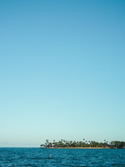 Gratis Fotos de stock gratuitas de cielo azul, cuerpo de agua, isla Foto de stock