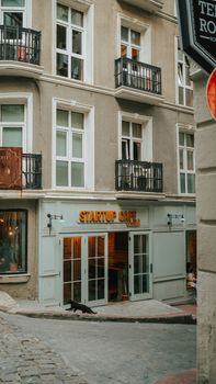 Elegant European street with startup cafe and urban architecture.
