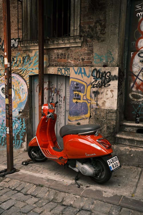 Free Red Motorcycle Parked on Side of the Street Stock Photo