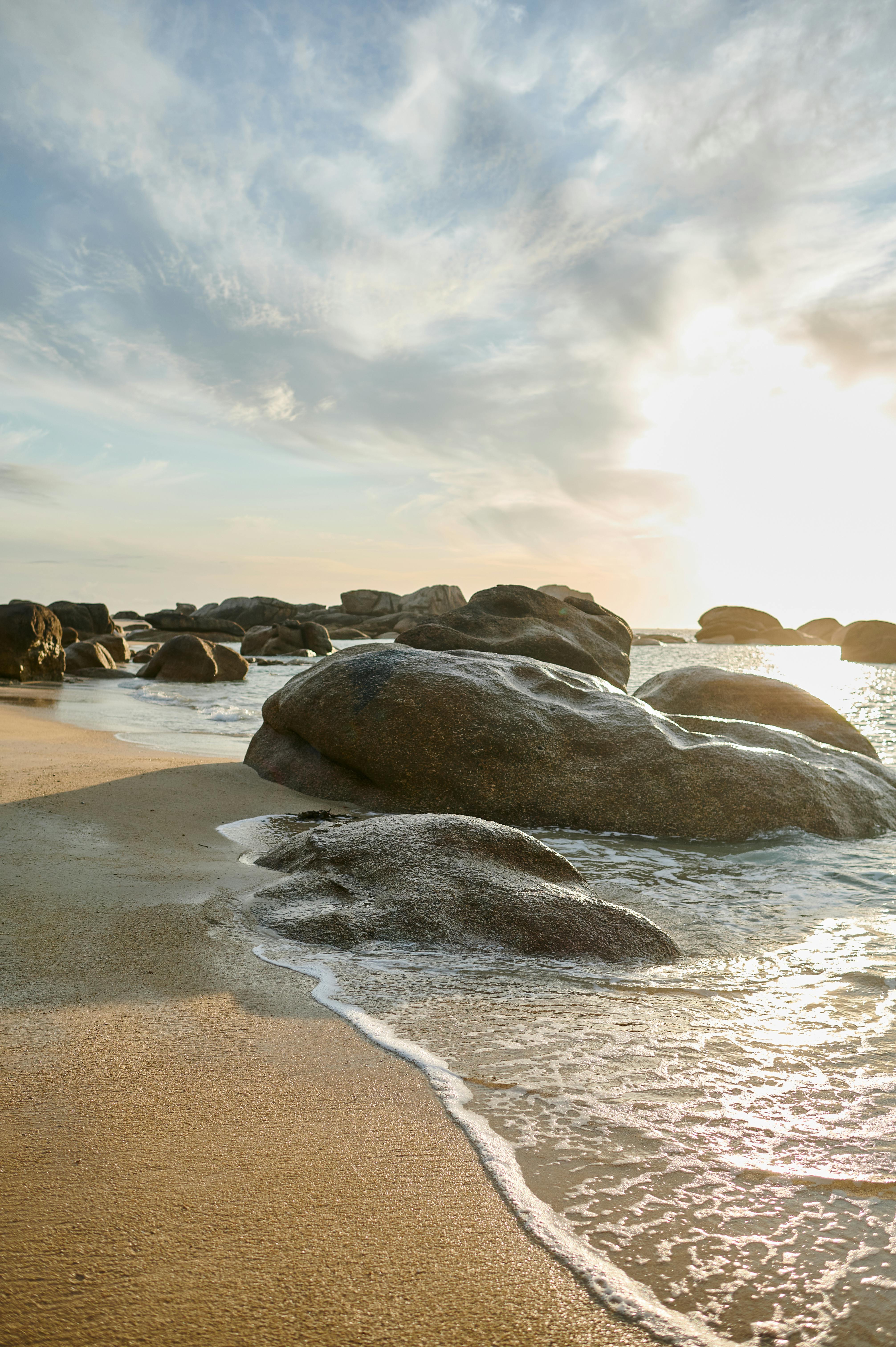 Gray Rocks on Seashore · Free Stock Photo