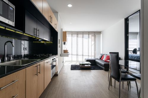 Free Contemporary open-plan kitchen and living area in Bogotá, Colombia. Stock Photo