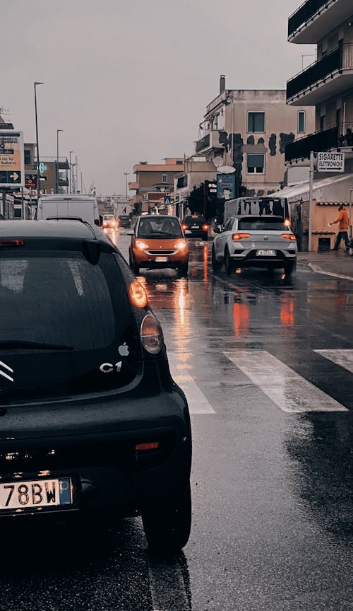 Free stock photo of after rain, busy street, car Stock Photo