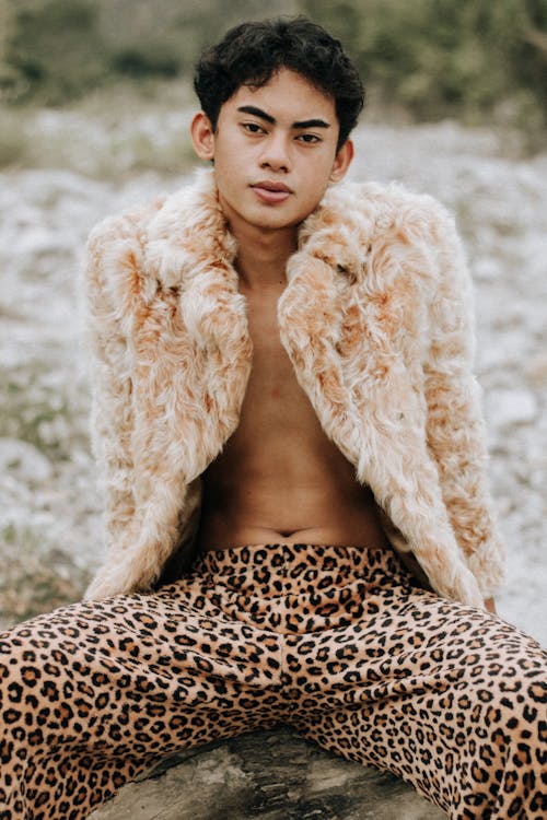 Man Posing in Cheetah Print Clothes