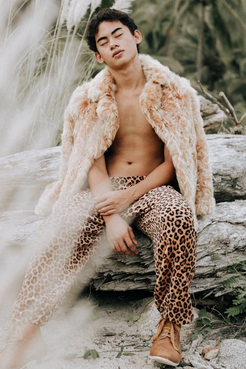 Man Posing in Cheetah Print Clothes