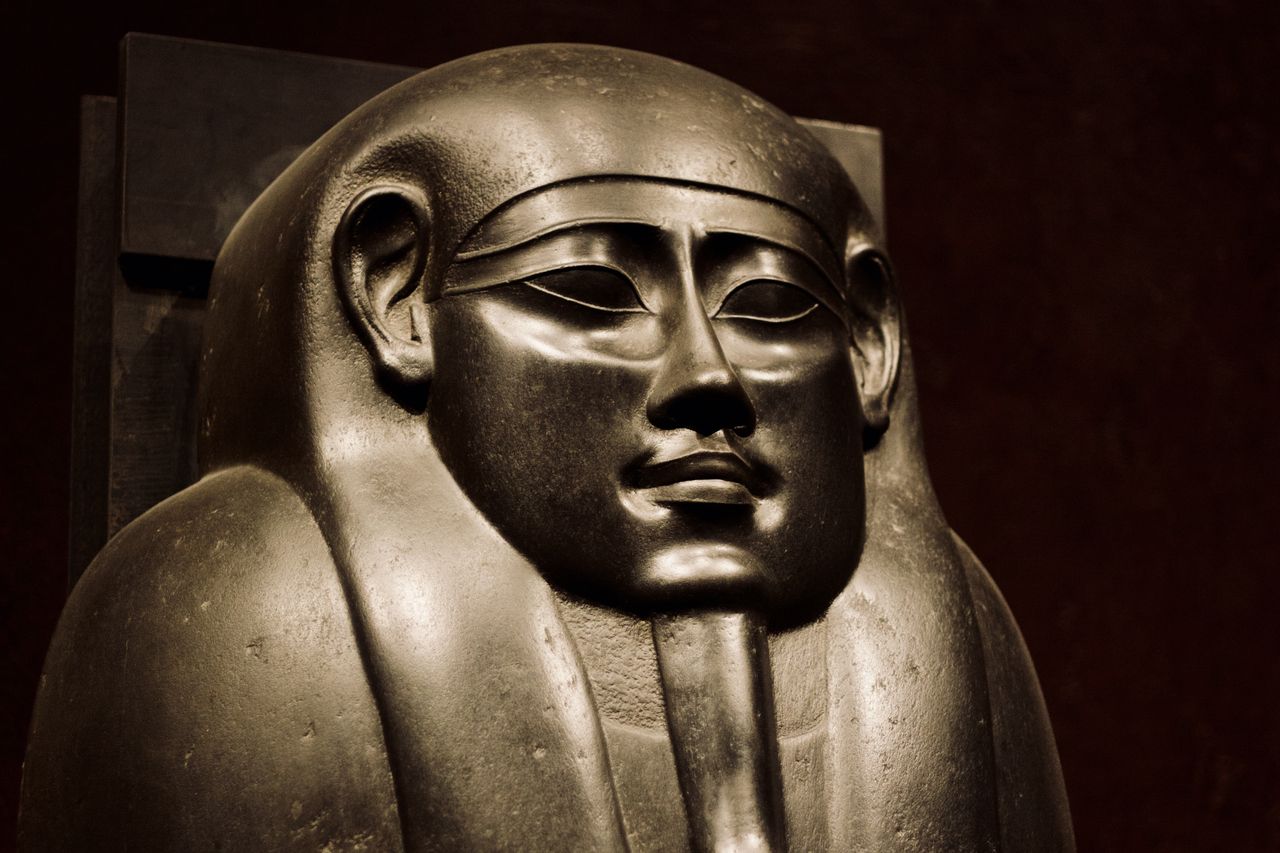 close up view of an ancient egyptian pharaoh statue highlighting intri