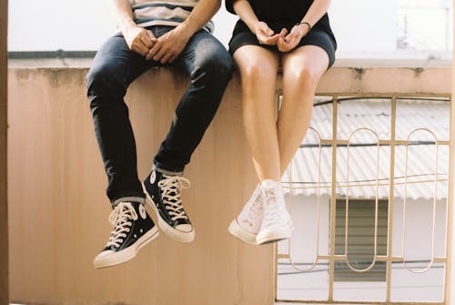 Free People Wearing Sneakers Stock Photo