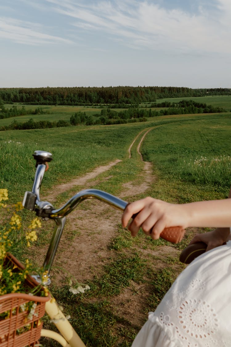 Close Up On Womans Hand On Bicycle Handlebar