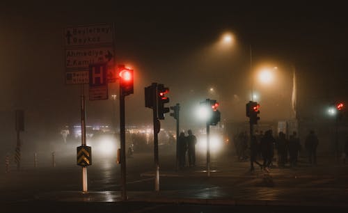Free People Walking on Sidewalk during Night Time Stock Photo