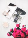 Selective Focus Photo of Magazine on White Background