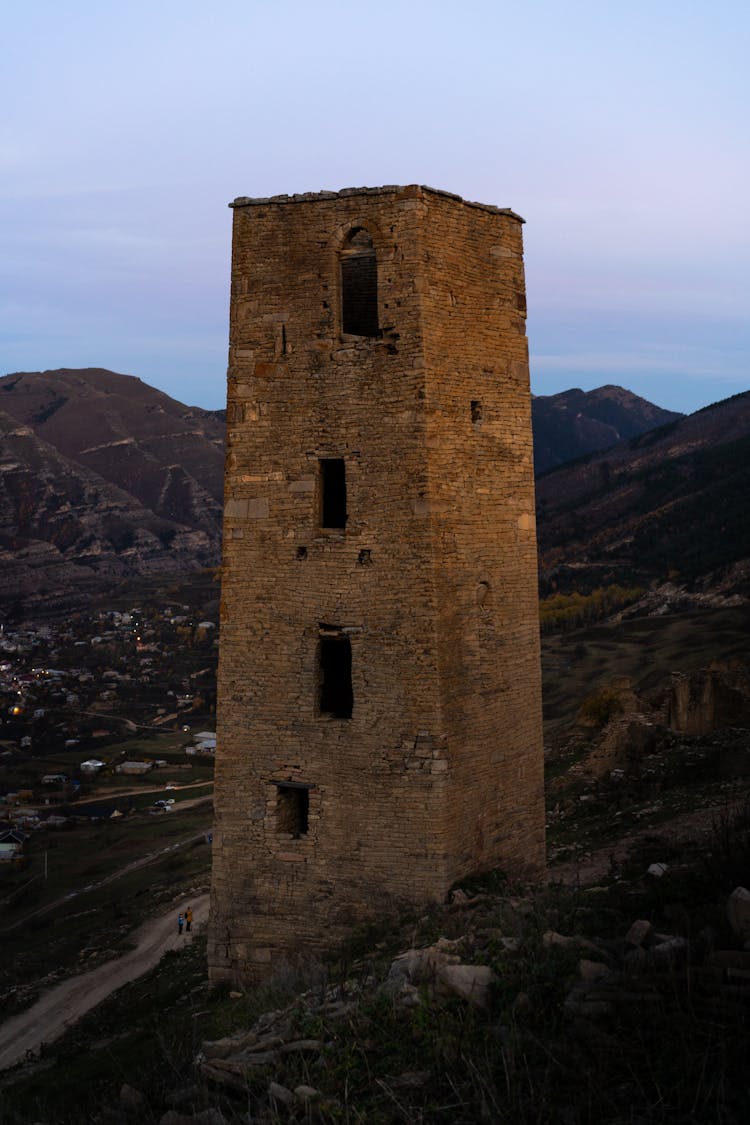 A Brick Tower Under Blue Sky