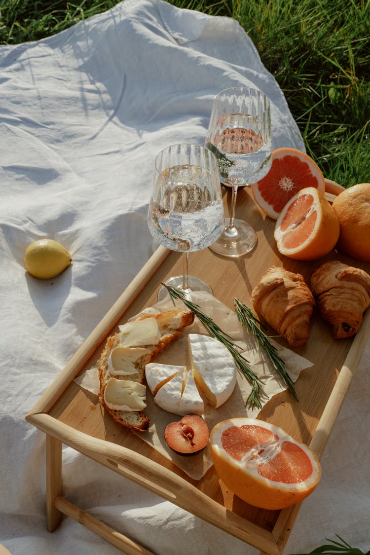 Picnic Table With Food On Blanket