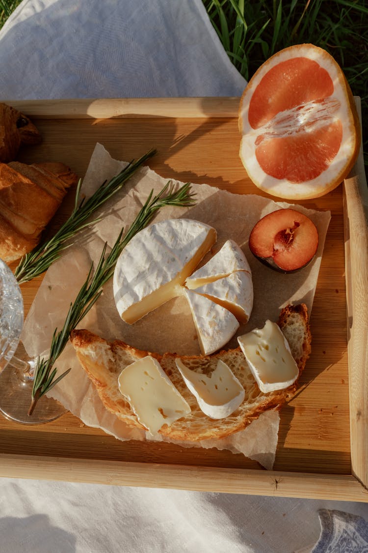 Picnic Table With Food On Blanket