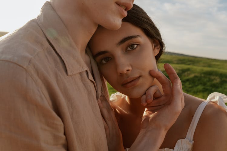 Woman Resting Her Head On Mans Shoulder