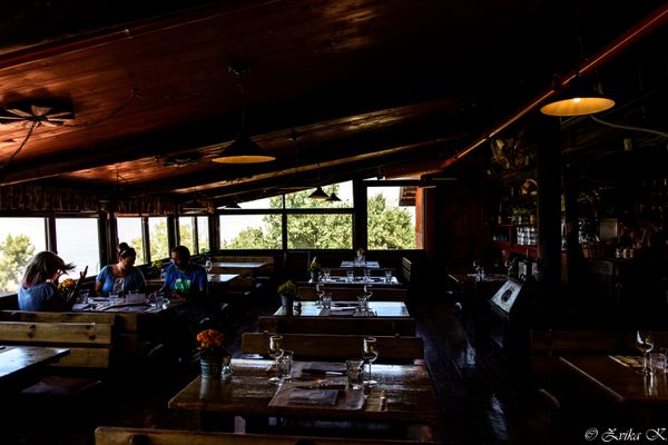 Busy restaurant dining area with customers