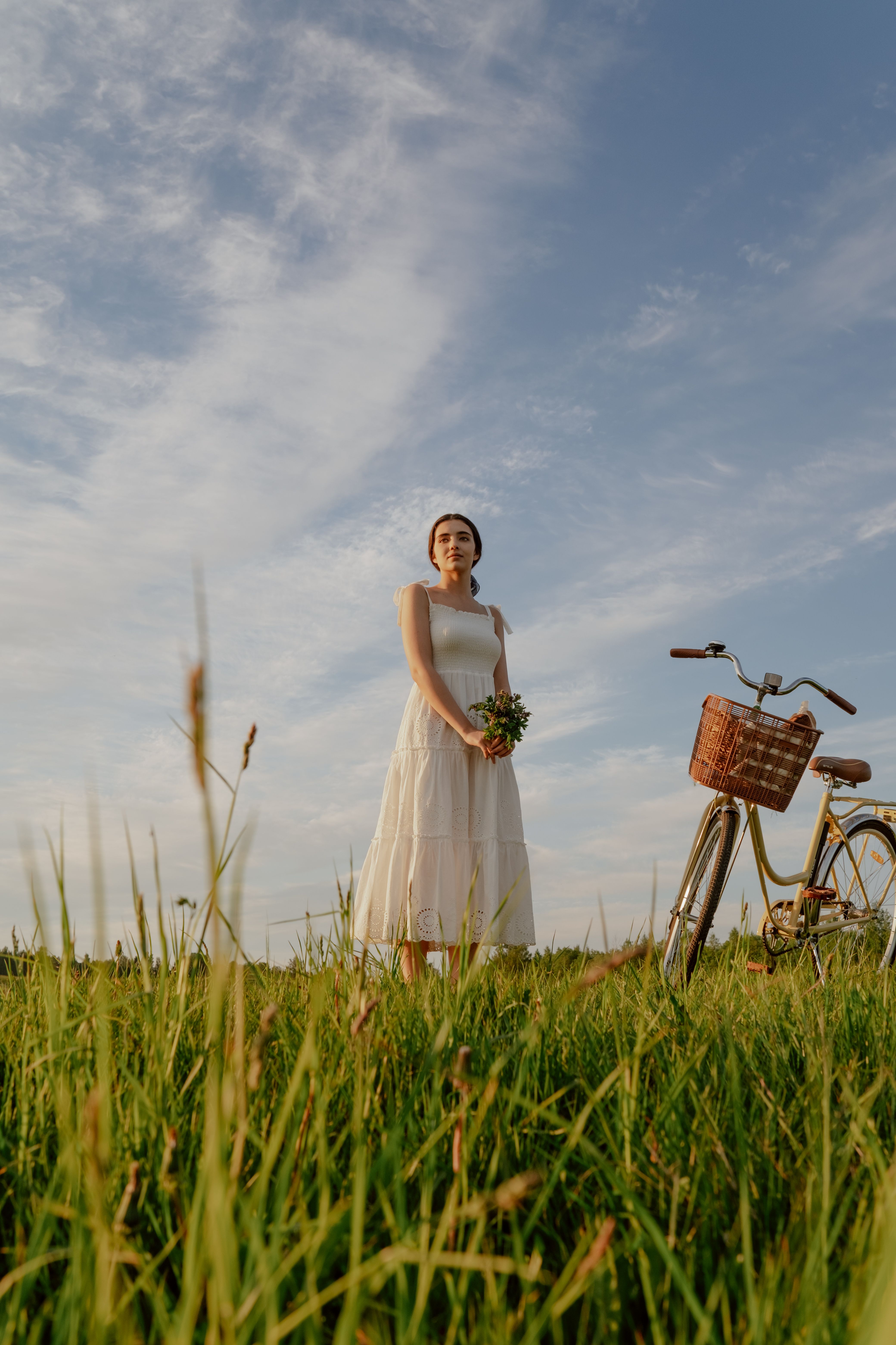Woman in White Dress and Bicycle on a Meadow · Free Stock Photo