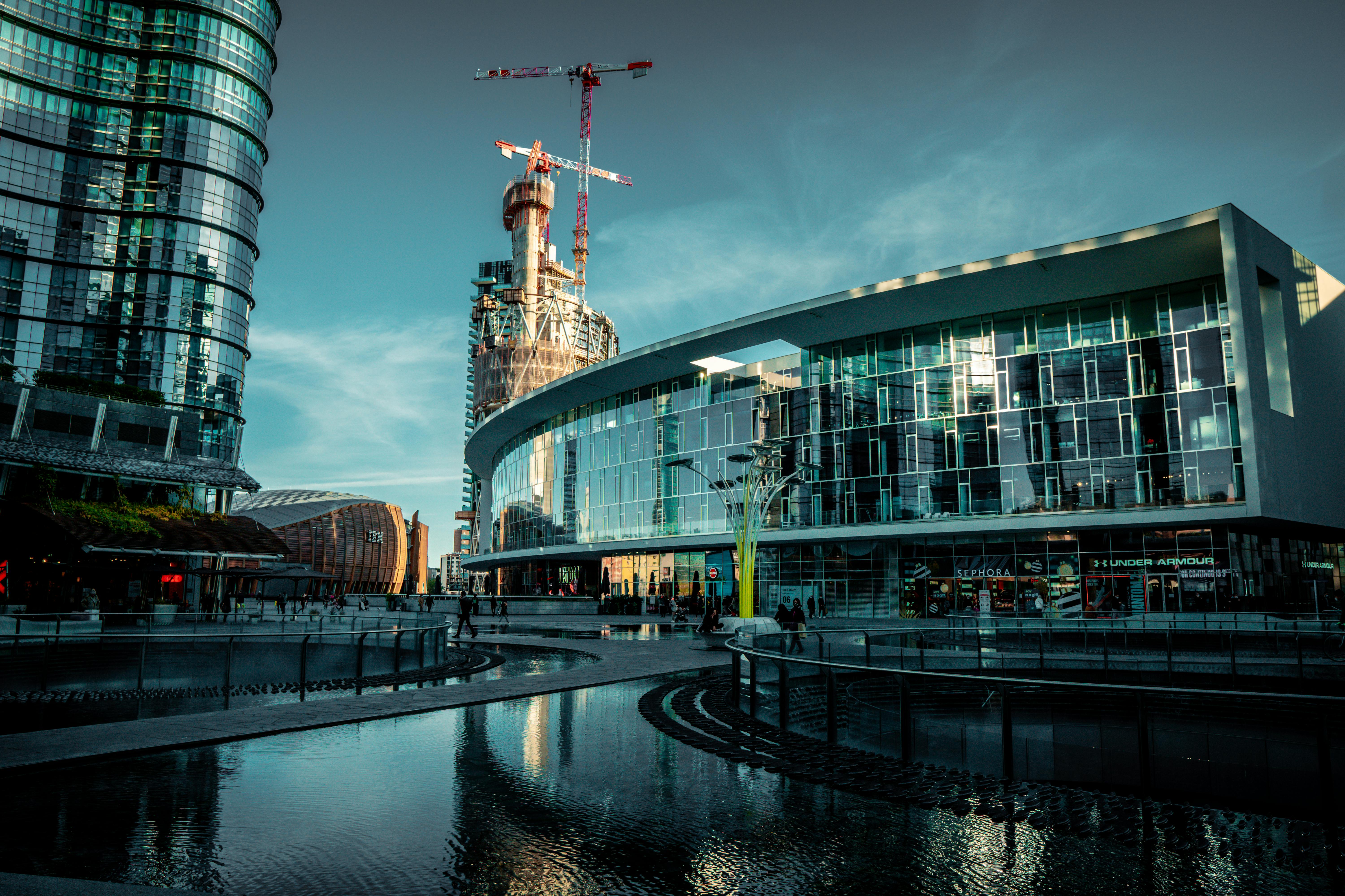 Explore the stunning modern architecture in Milan's Porta Nuova district with skyscrapers and urban views.