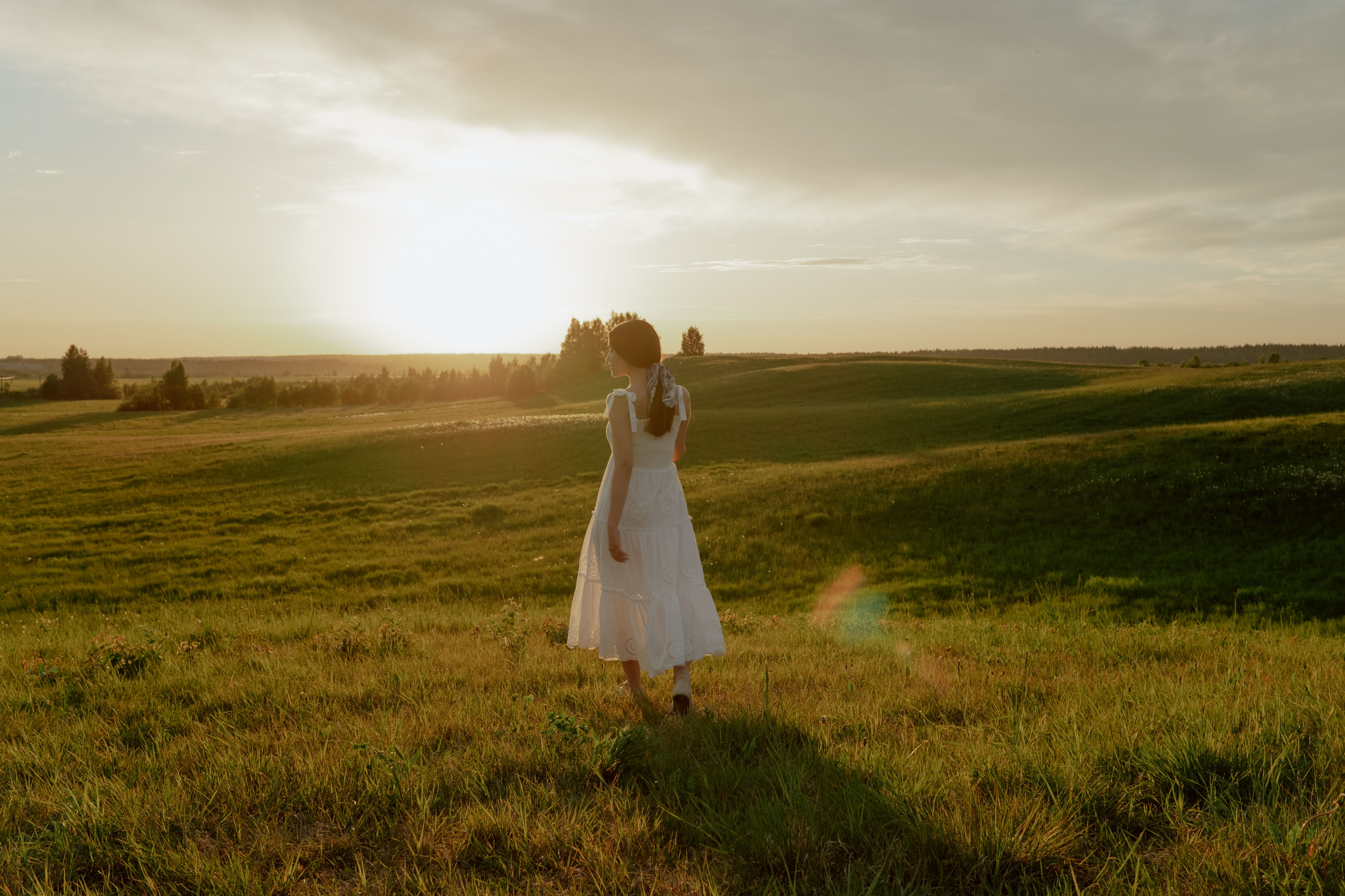 Woman in White Dress on a Meadow · Free Stock Photo