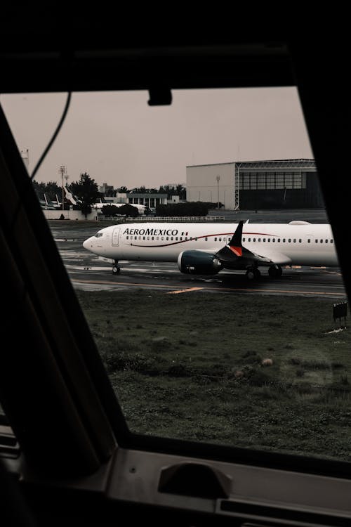 Gratis Immagine gratuita di aeroplano, aeroporto, finestra Foto a disposizione