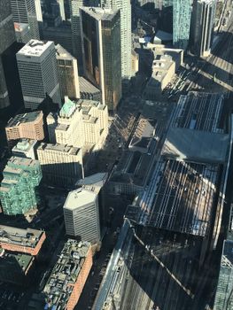 Breathtaking aerial view of Toronto city showcasing iconic skyscrapers and dense urban architecture.