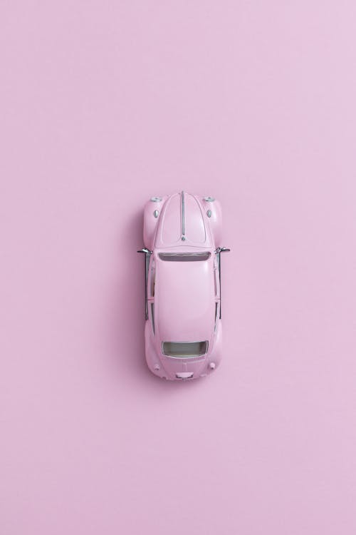Overhead Shot of a Pink Toy Car