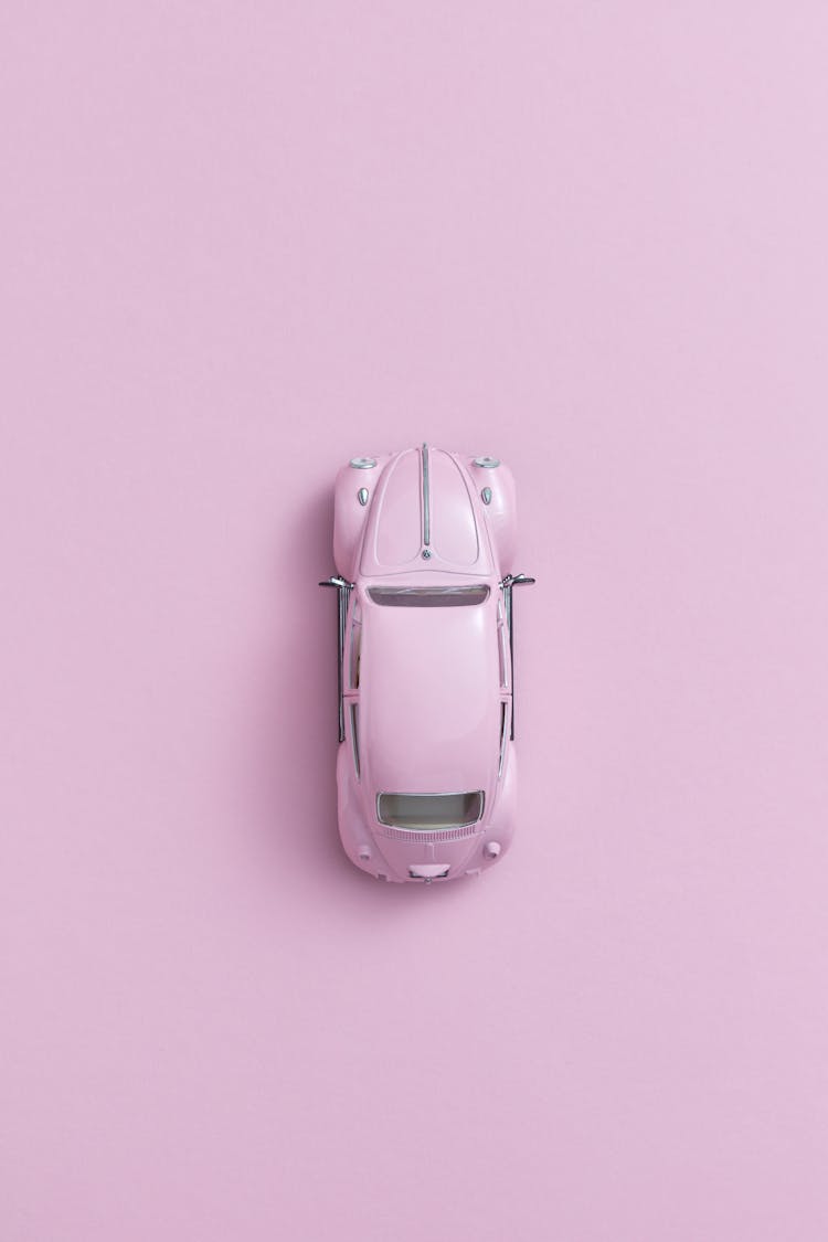 Overhead Shot Of A Pink Toy Car