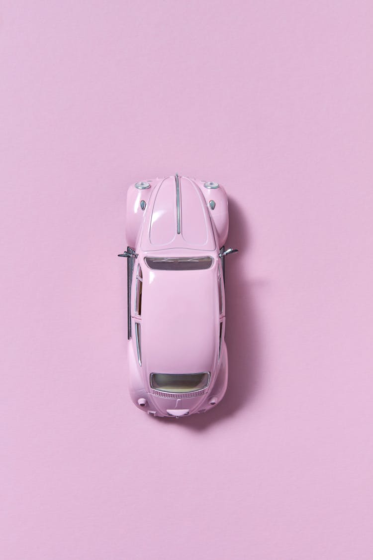 Overhead Shot Of A Pink Toy Car