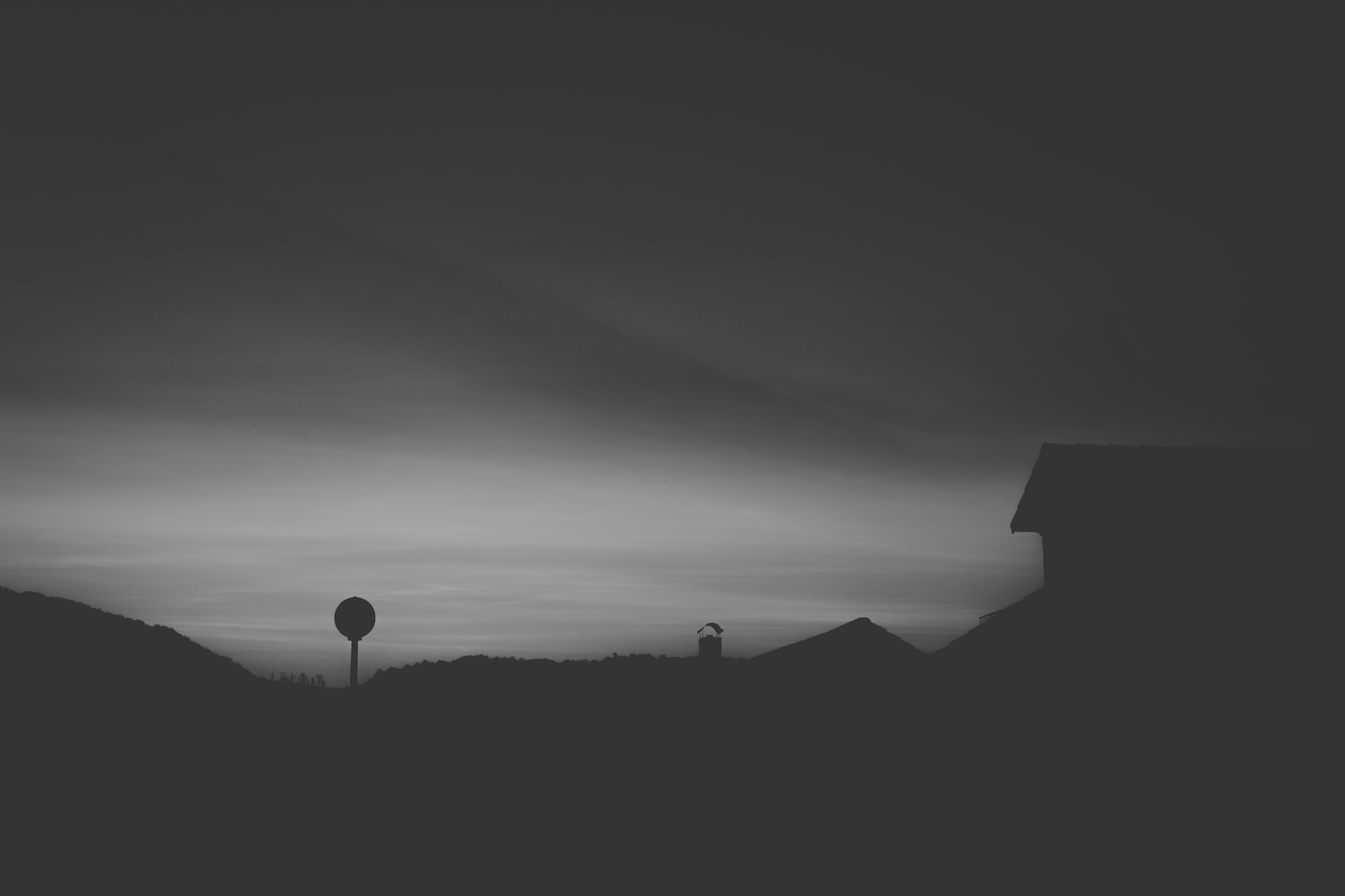 Free stock photo of black and white, houses, sky