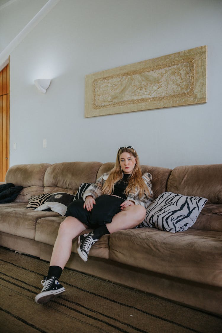 Woman Sitting On The Couch