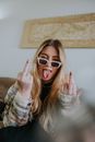 Woman Posing with Her Middle Fingers