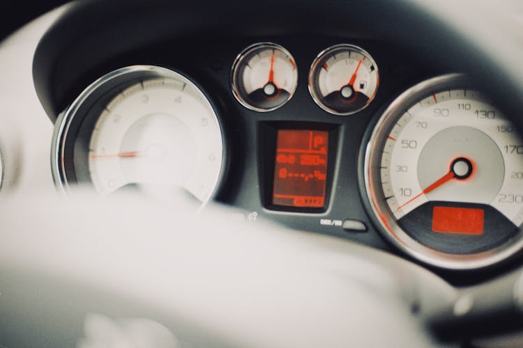 Instrument Panel Of A Car In Close Up Photography