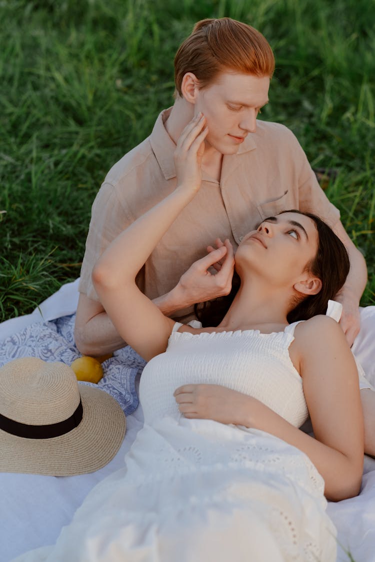 Young Woman Touching Face Of Her Boyfriend