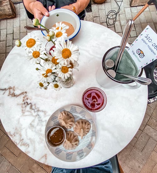 Free Food and Drinks Served on Marble Top Table Stock Photo