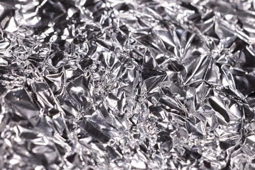 A Close-Up Shot of a Crumpled Aluminum Foil