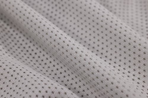 White Fabric with Holes in Close-up Photography