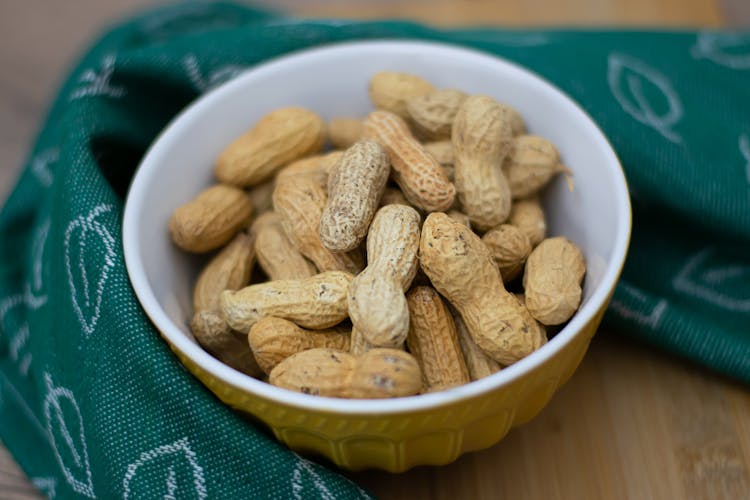 Brown Peanuts In White Bowl