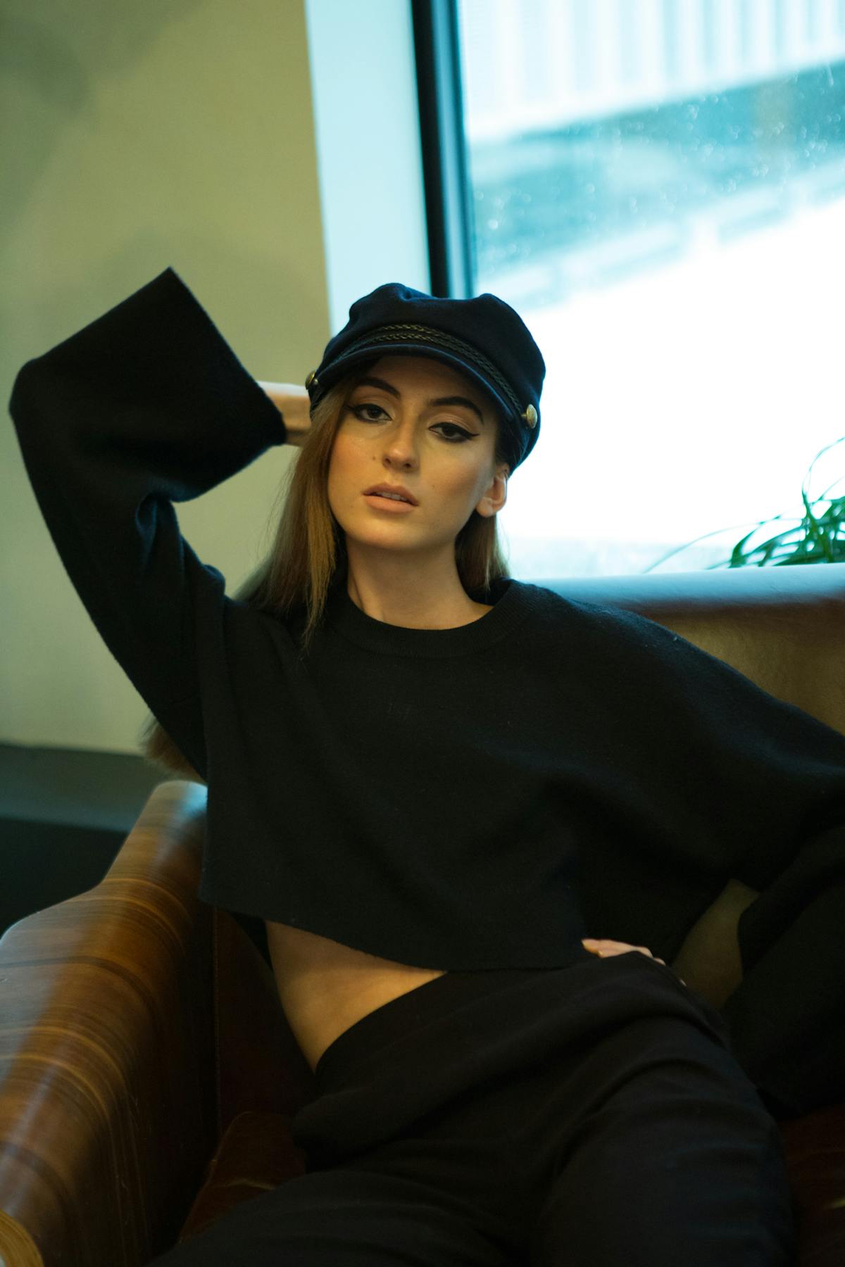 Sliced apples served with peanut butter on a wooden board