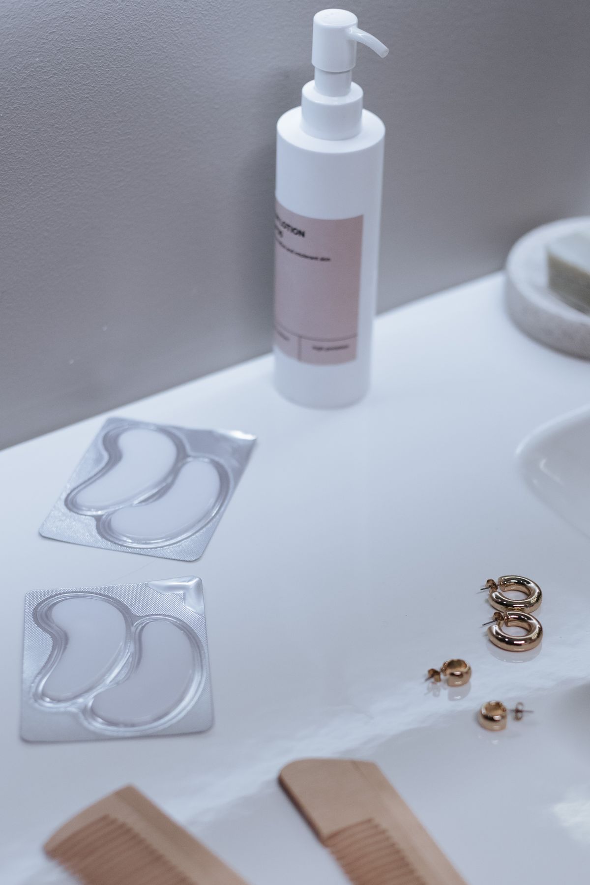 Bathroom vanity with neatly arranged personal care products and accessories