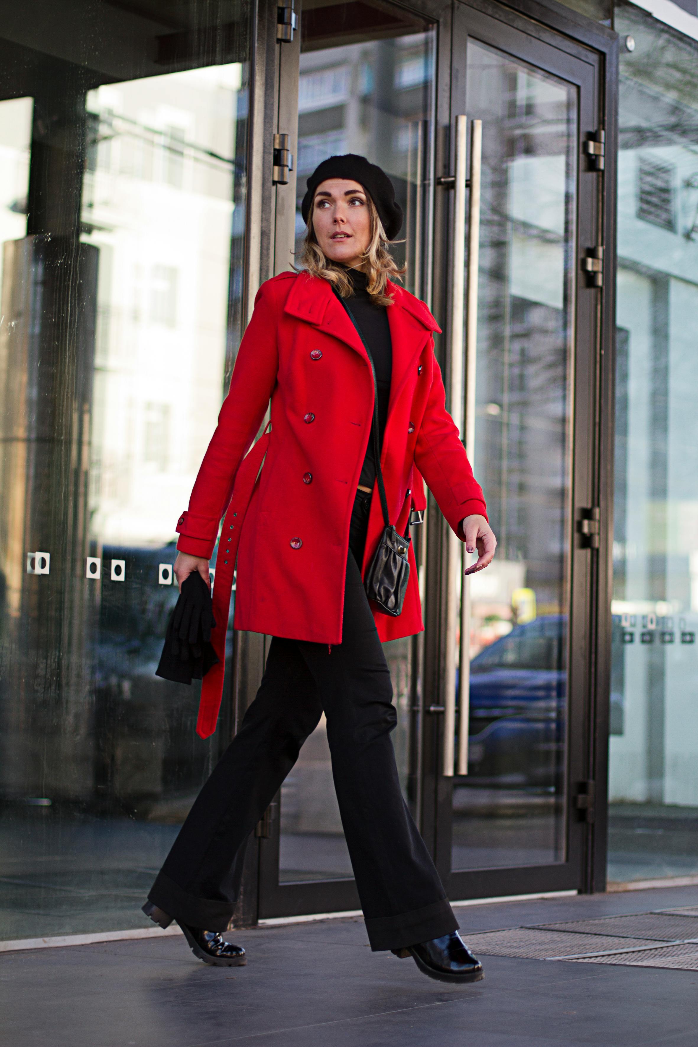 A Woman wearing Red Jacket while Walking · Free Stock Photo
