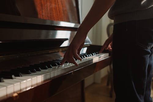 Person Playing a Piano