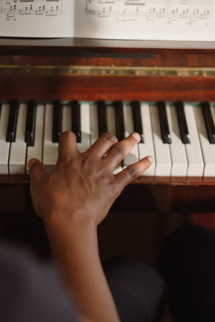 Hand On Piano Keys