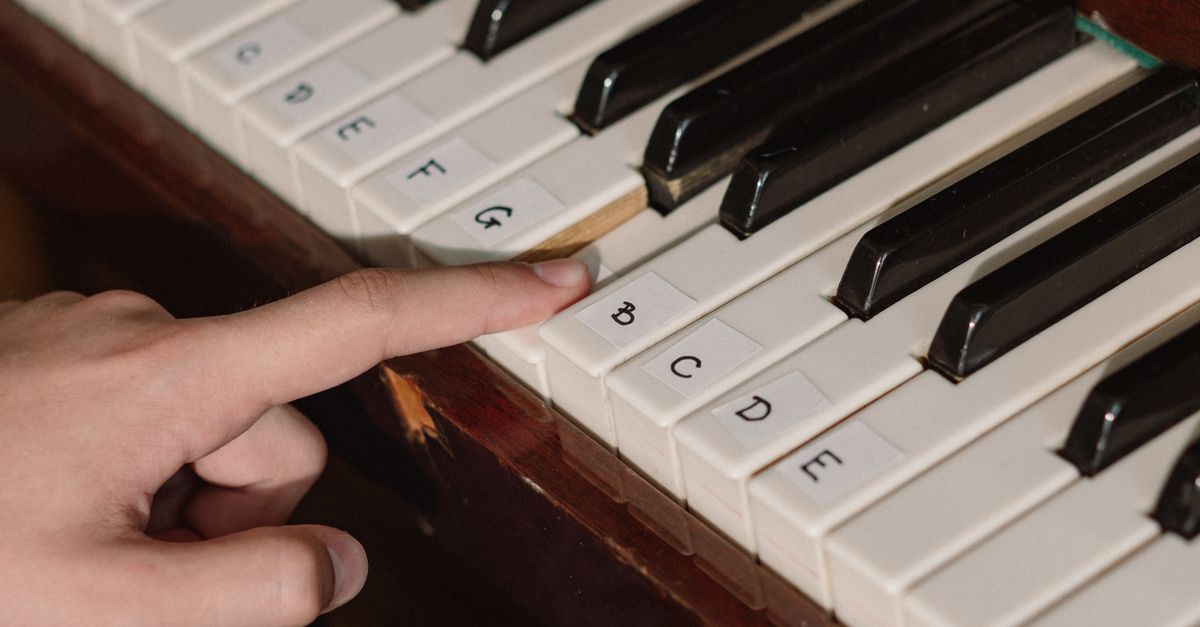 Finger Clicky Instrument A Finger Clicking the Piano Key · Free Stock Photo