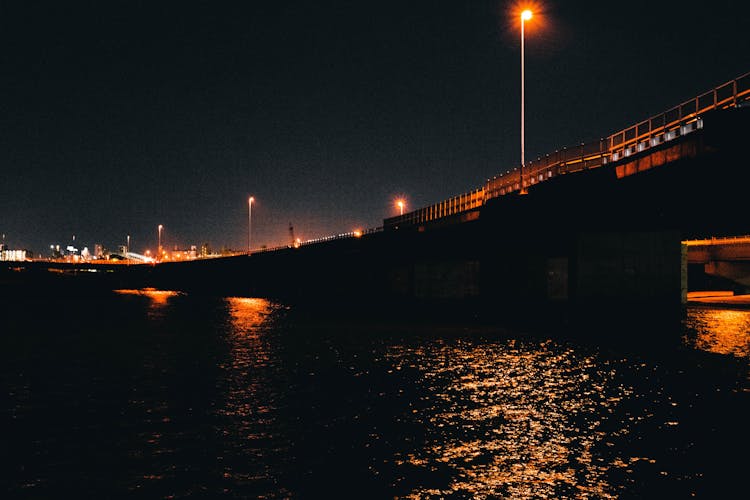 Bridge In City At Night