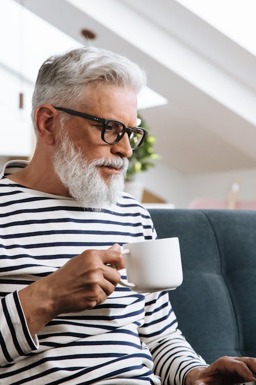 Profile View on Man with Cup in Hand