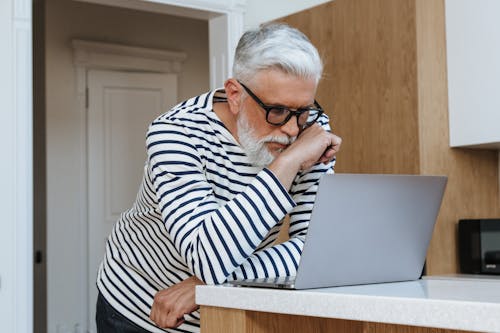 Senior Adult Working on the Laptop